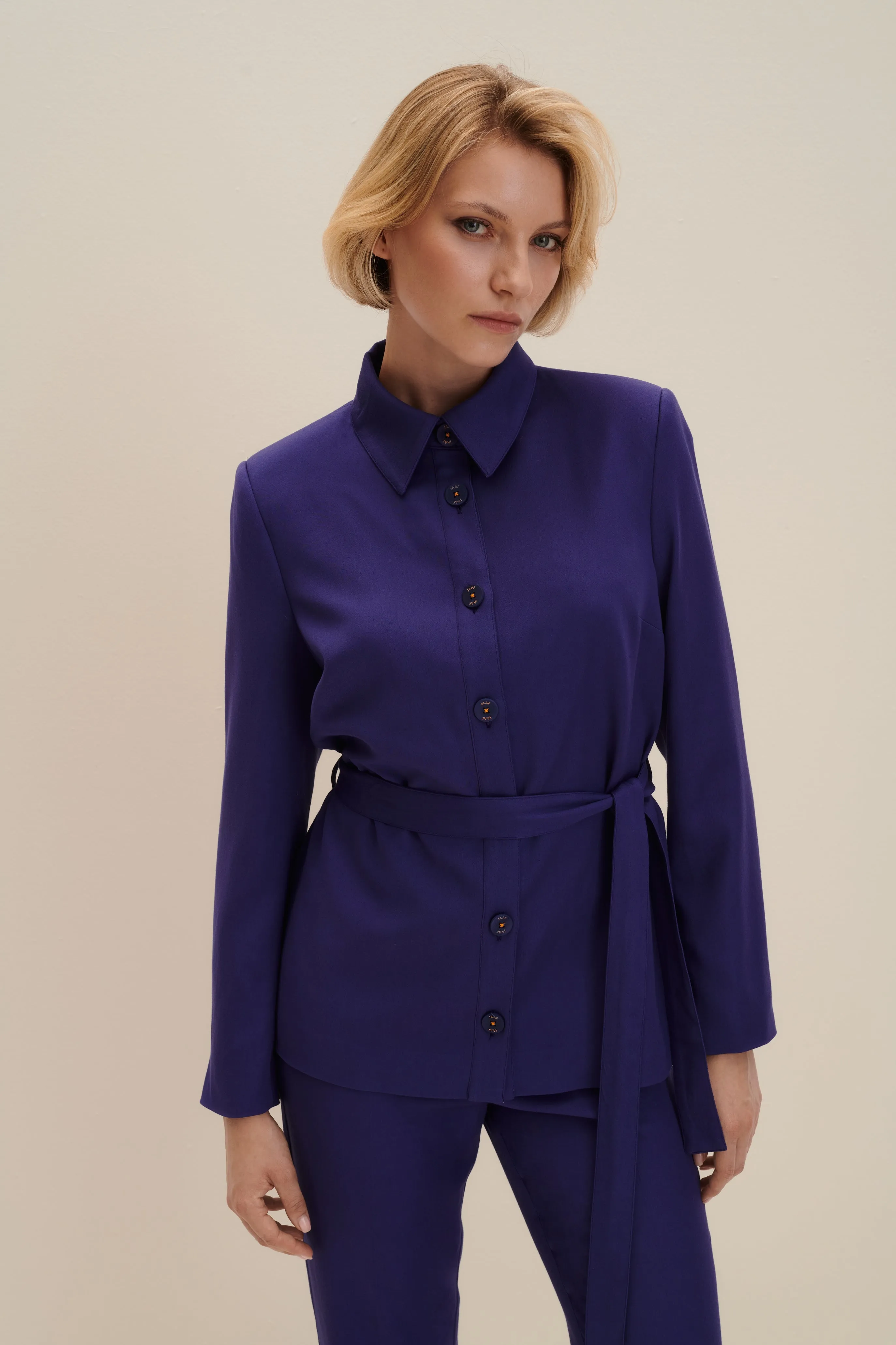 Belted uniform blazer in Persian Indigo