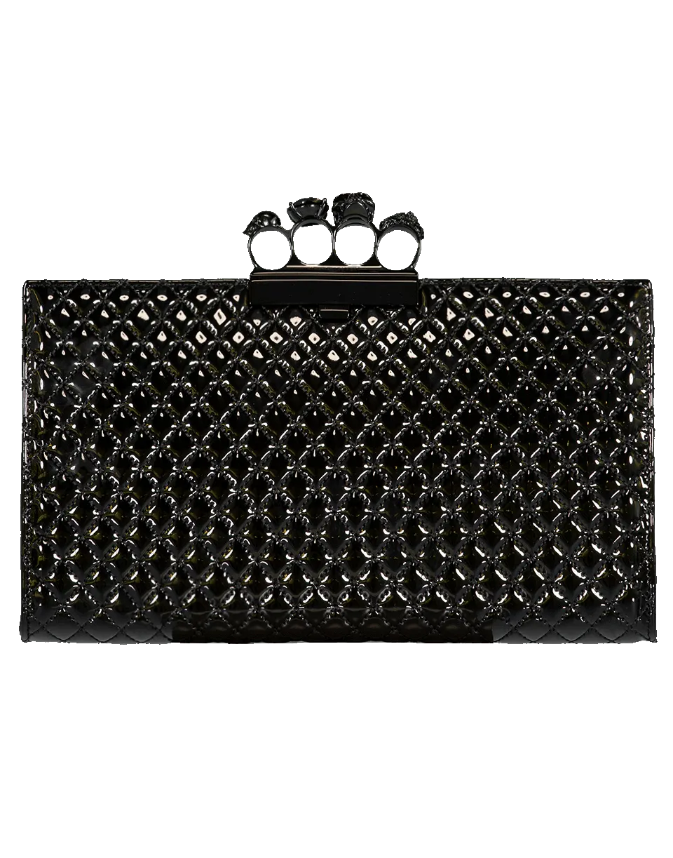 Four Ring Skull Clutch